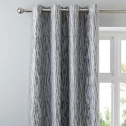 Dunelm Linear Waves Silver Eyelet Curtains