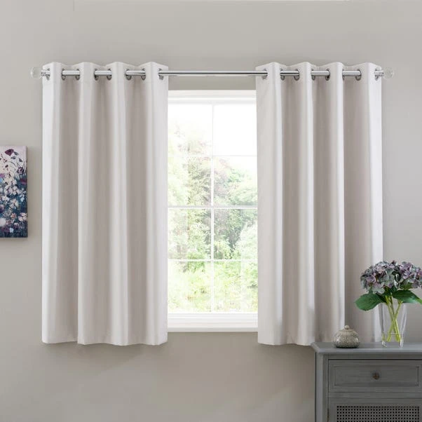 Dunelm Solar Ivory Blackout Eyelet Curtains 8 Dunelm Solar Ivory Blackout Eyelet Curtains - Image 6